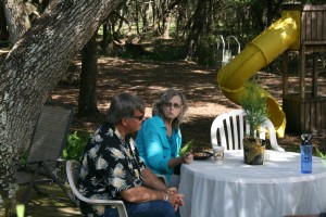 Rare photo of Nancy Bissett, who may have just eaten a pickle, seated with Danny Perkins at lunch. 