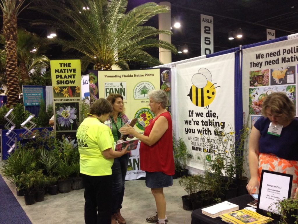 Volunteers chatting with attendees