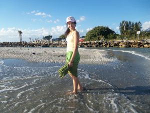 Girl enjoying Sanibel beach