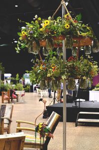 Mason jar chandelier filled with native wildflowers.