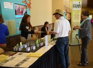 Jenny Evans and Becca Grotrian of SCCF at the registration desk. They take "service with a smile" to a whole other level.