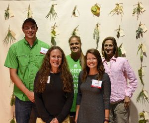 SCCF Team in front of Williams Wildflowers plant wall. L-R: Jonathan Stechschulte, Jenny Evans, Becca Grotrian, Rachel Turner and Sue Ramos. 