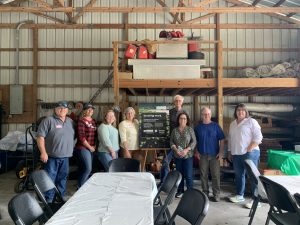 Incoming and outgoing Green Seasons team L-R: incoming Earth Balance Grower Joe Hayden, customer relations specialist Janie Linscott, Ebonie Gorniak, Sarah Laroque CEO, outgoing Roger Triplett, Vicki Triplett, Mark Holdren and at far right, Earth Balance Chris Borowski